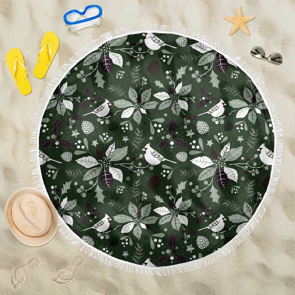 Round green beach blanket with festive bird and leaf pattern, white fringed border