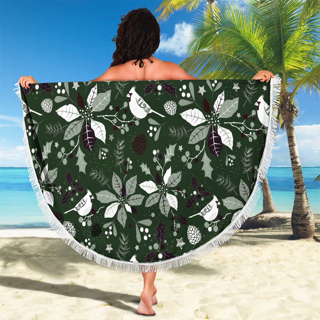 Round green beach blanket featuring birds, leaves and berries, fringed white border