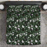 Green duvet cover bedding set with Christmas leaf and bird pattern, top view