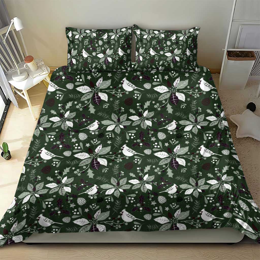 Green Christmas bedding set with coordinated pillowcases and leaf-and-bird pattern