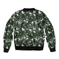Green bomber jacket with festive leaf and bird pattern, ribbed hem and crew collar