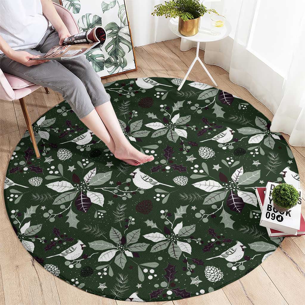 Green round carpet with festive white bird and holly leaf pattern