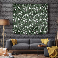 Green Christmas tapestry featuring repeating bird and leaf motifs, rectangular wall hanging