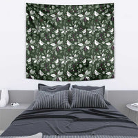 Green Christmas tapestry with repeating bird and holly pattern, rectangular wall hanging