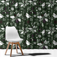 Green window curtain with white bird and leaf pattern, draped across the wall