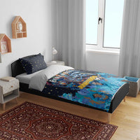 Blue bedding set with two star pillowcases and Junkanoo mask and dancers graphic duvet