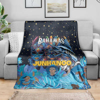 Navy blue decorative blanket with Bahamas Junkanoo artwork, star details, and bold colors