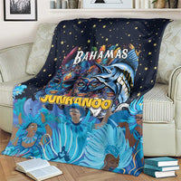 Dark blue throw blanket with starry background and Junkanoo mask, dancer, and fish print