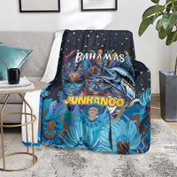 Blue and dark blue blanket with star accents and vibrant Junkanoo character artwork