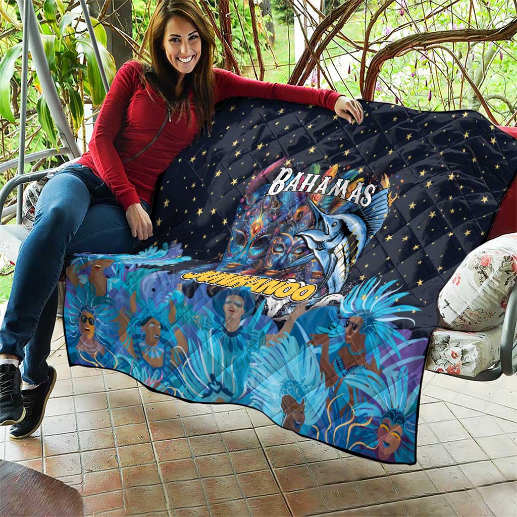 Blue quilt on sofa with star pattern and Bahamas Junkanoo mask artwork