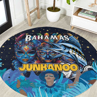 Round blue round carpet rug with Junkanoo masks and “BAHAMAS” and “JUNKANOO” text