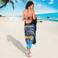Blue sarong with star pattern and Junkanoo mask print, tied at sides