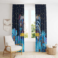 Hanging blue Junkanoo window curtains with golden stars and marlin mask artwork