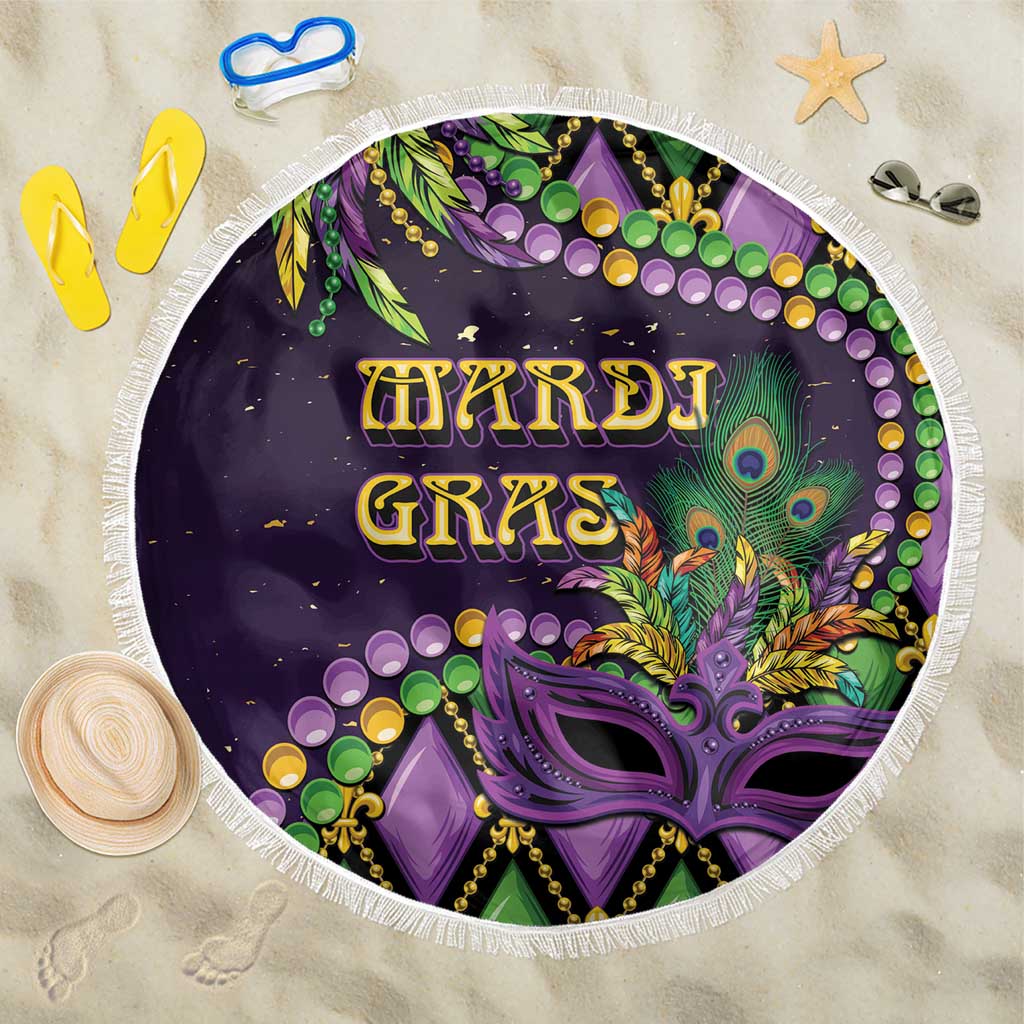 Round purple beach blanket with tassel fringe and fleur-de-lis Mardi Gras design