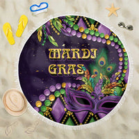 Round purple beach blanket with tassel fringe and fleur-de-lis Mardi Gras design