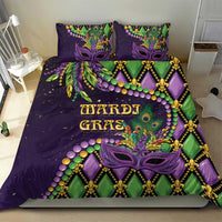Purple Mardi Gras bedding set with two pillows and duvet showing mask, fleur-de-lis trim and green