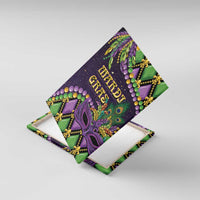 Mardi Gras canvas wall art angled view, purple masquerade mask graphic with “HARDI GRAS” lettering