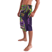 Purple Mardi Gras lavalava skirt with green feather mask motif and side print