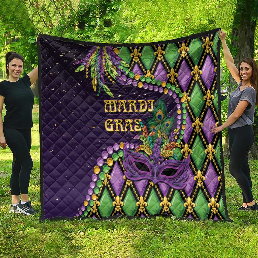 Purple Mardi Gras quilt blanket with fleur-de-lis borders, Mardi Gras text, and mask