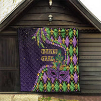 Purple Mardi Gras quilt displayed outdoors in a barn with mask, beads, and fleur-de-lis