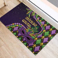 Mardi Gras rubber doormat with ornate purple mask, green and purple geometric border