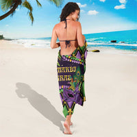 Luxury Mardi Gras sarong scarf wrap in purple and green with fleur-de-lis motifs