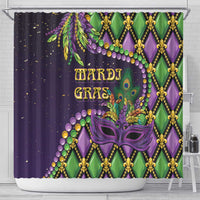 Mardi Gras shower curtain with purple mask and gold “MARDI GRAS” text over green/purple pattern