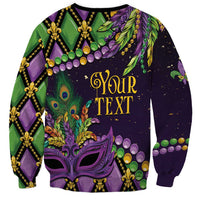 Unisex purple Mardi Gras sweatshirt with green peacock feather and fleur-de-lis mask