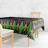 Mardi Gras tablecloth with purple and green fleur-de-lis and gold ornament print