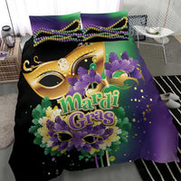 Purple and black Mardi Gras duvet cover set with gold mask, feather graphics, and 2 pillows