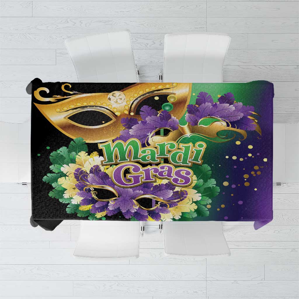 Carnival tablecloth with Mardi Gras mask, purple feathers, and gold lettering