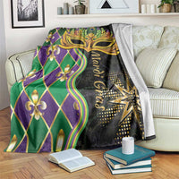 Mardi Gras throw blanket with gold mask and fleur-de-lis on green purple diamond design