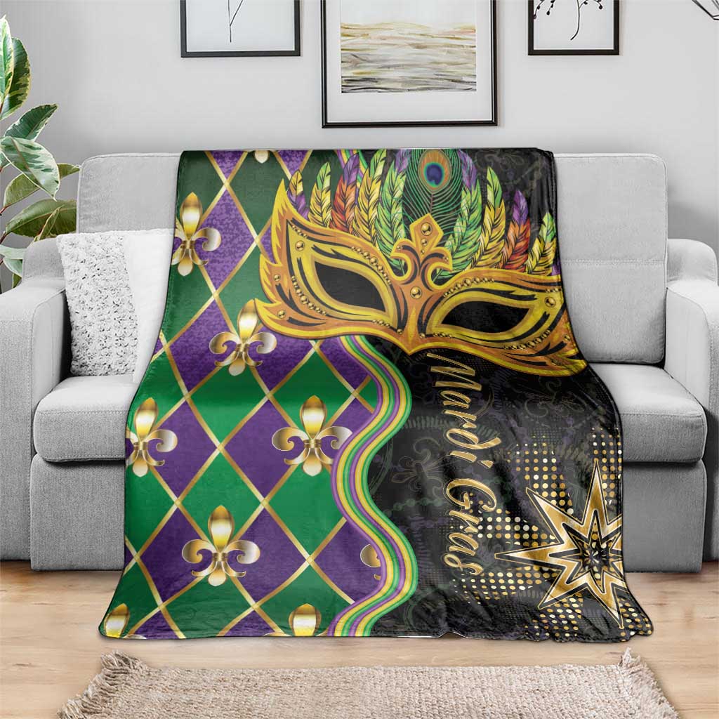 Mardi Gras blanket draped over sofa, gold mask center with green purple fleur-de-lis diamonds
