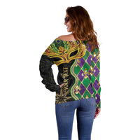 Women’s off-shoulder sweater, back view with gold mask motif and diamond pattern
