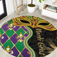 Round decorative carpet with colorful gold mask and fleur-de-lis pattern