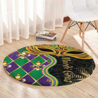 Round decorative carpet with colorful geometric print and gold mask design