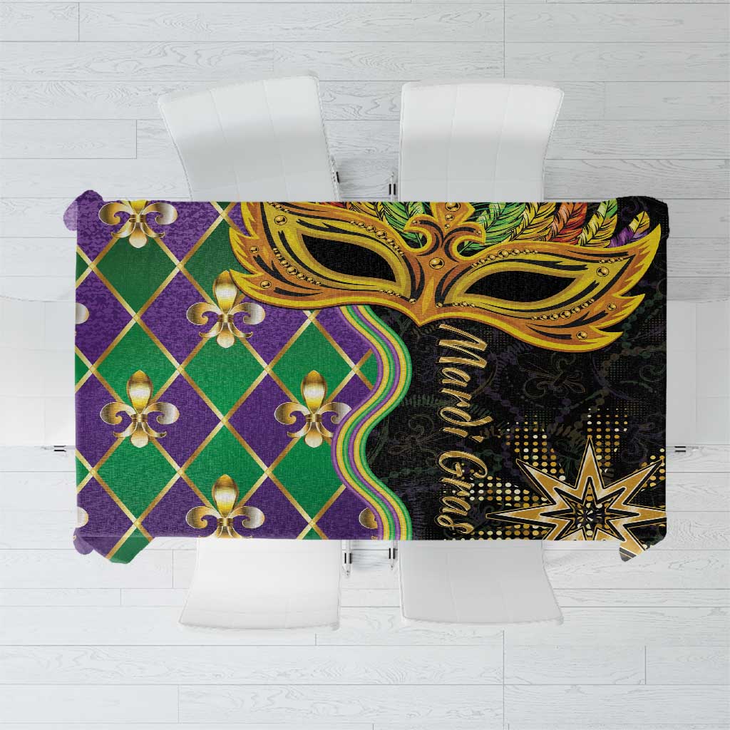 Mardi Gras tablecloth with purple and green diamond pattern and gold mask detail