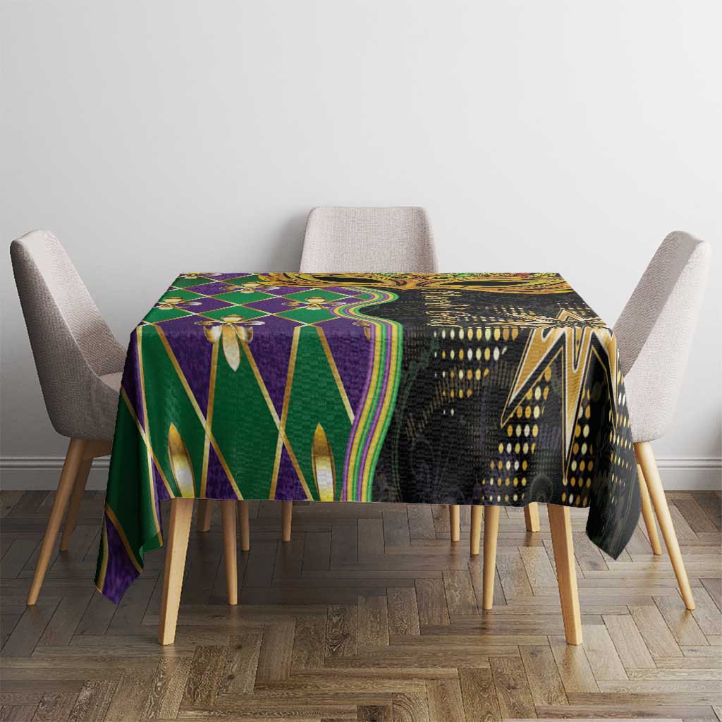 Mardi Gras tablecloth on dining table, black fabric with green, purple, and gold geometric print