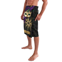 Mardi Gras lavalava with purple mask graphic and gold star, side view on black fabric