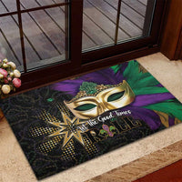 Colorful Mardi Gras rubber doormat with gold mask and star beside “Let the Good Times ROLL”