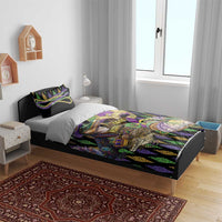 Mardi Gras alligator duvet on bed with black-and-purple zigzag pattern and fleur-de-lis accents