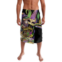 Black Mardi Gras swim shorts with colorful mask and fleur-de-lis graphic, glittery beads
