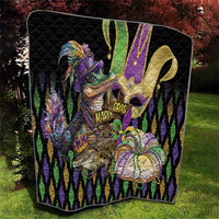 Black quilt with raised-quilt texture featuring alligator head, fleur-de-lis, purple and gold