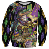 Colorful alligator Mardi Gras sweatshirt with purple/green fleur-de-lis and glitter beads