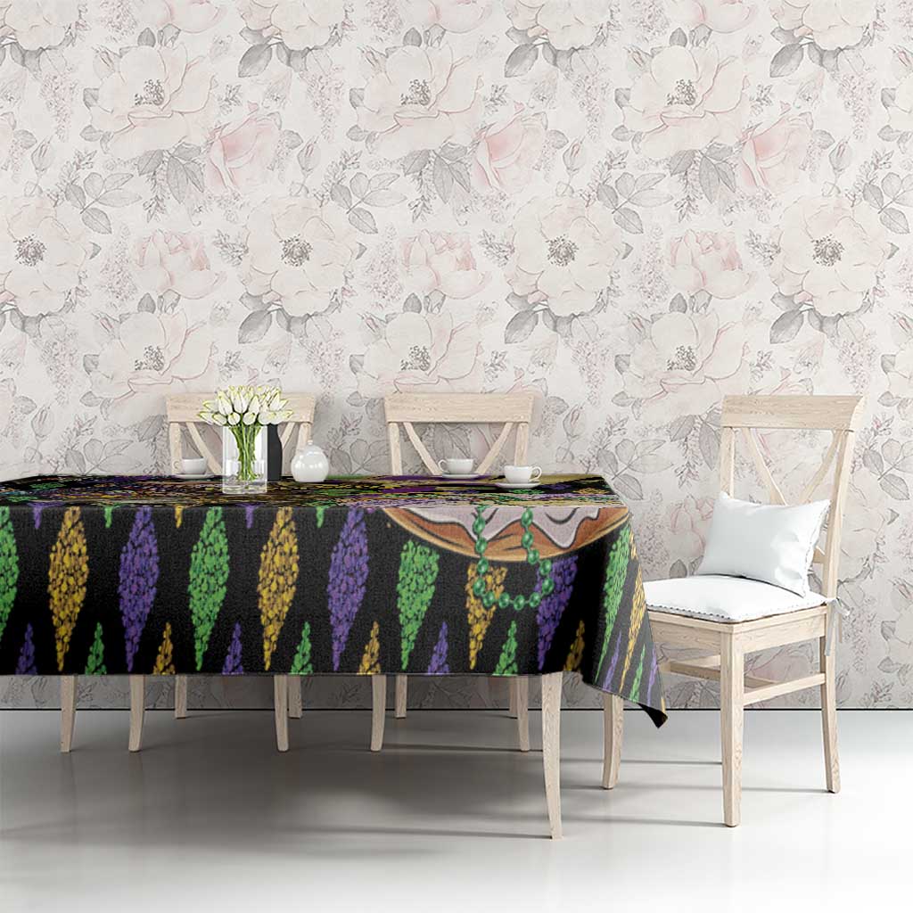 Mardi Gras tablecloth on dining table, black purple green vertical stripe pattern
