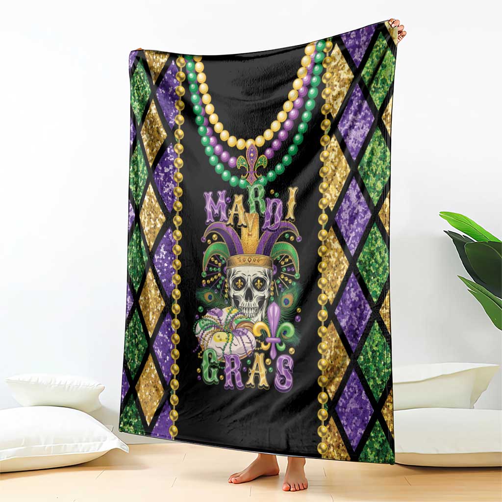 Mardi Gras skull blanket draped over couch, black center with bead necklace graphic