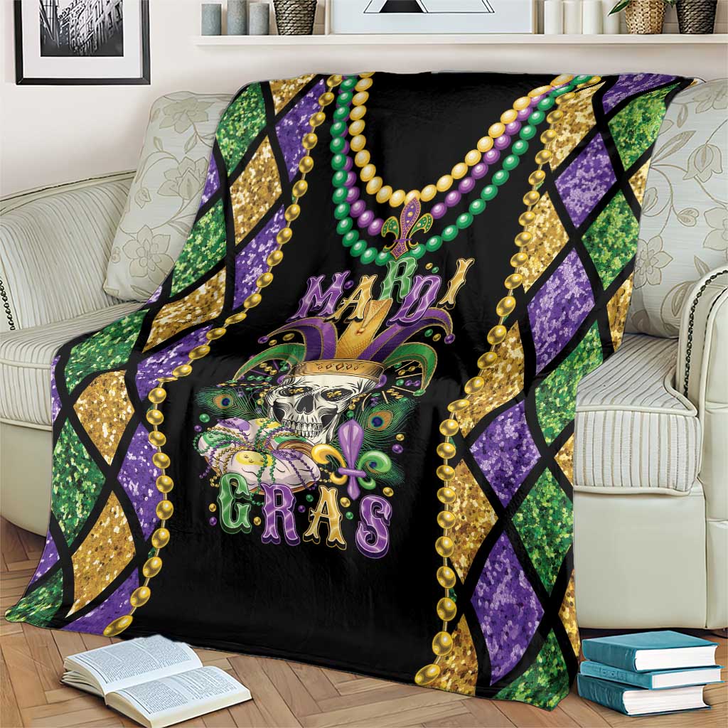 Mardi Gras skull blanket on bed, purple and green diamond sides with gold bead trim