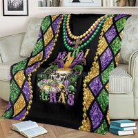 Mardi Gras skull blanket on bed, purple and green diamond sides with gold bead trim