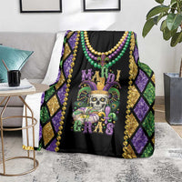 Mardi Gras skull blanket on gray couch, black field with colorful bead collar artwork