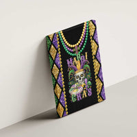 Mardi Gras skull canvas wall art with bead garland in green, purple, and gold